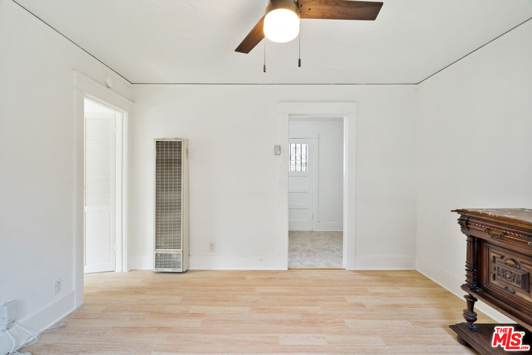 1747 9th Street Santa Monica, CA 90404 - Photo 13 of 24 a view of an empty room with wooden floor