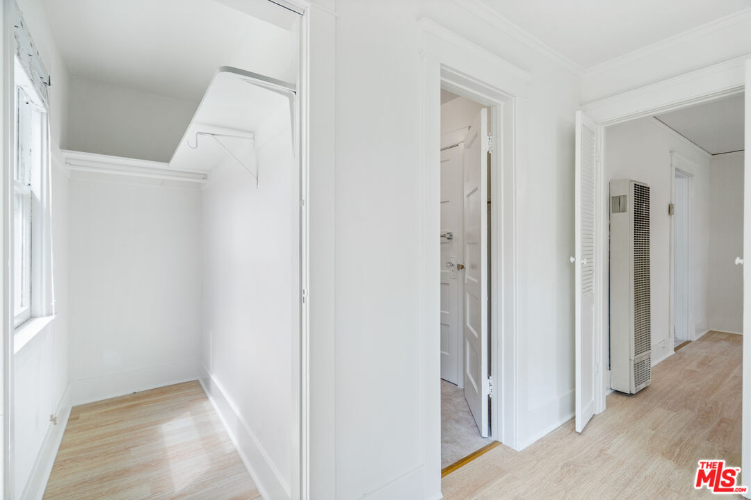 1747 9th Street Santa Monica, CA 90404 - Photo 19 of 24 a view of a hallway with closet and bathroom