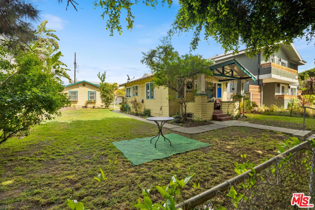 1747 9th Street Santa Monica, CA 90404 - Photo 5 of 24 a front view of a house with a yard
