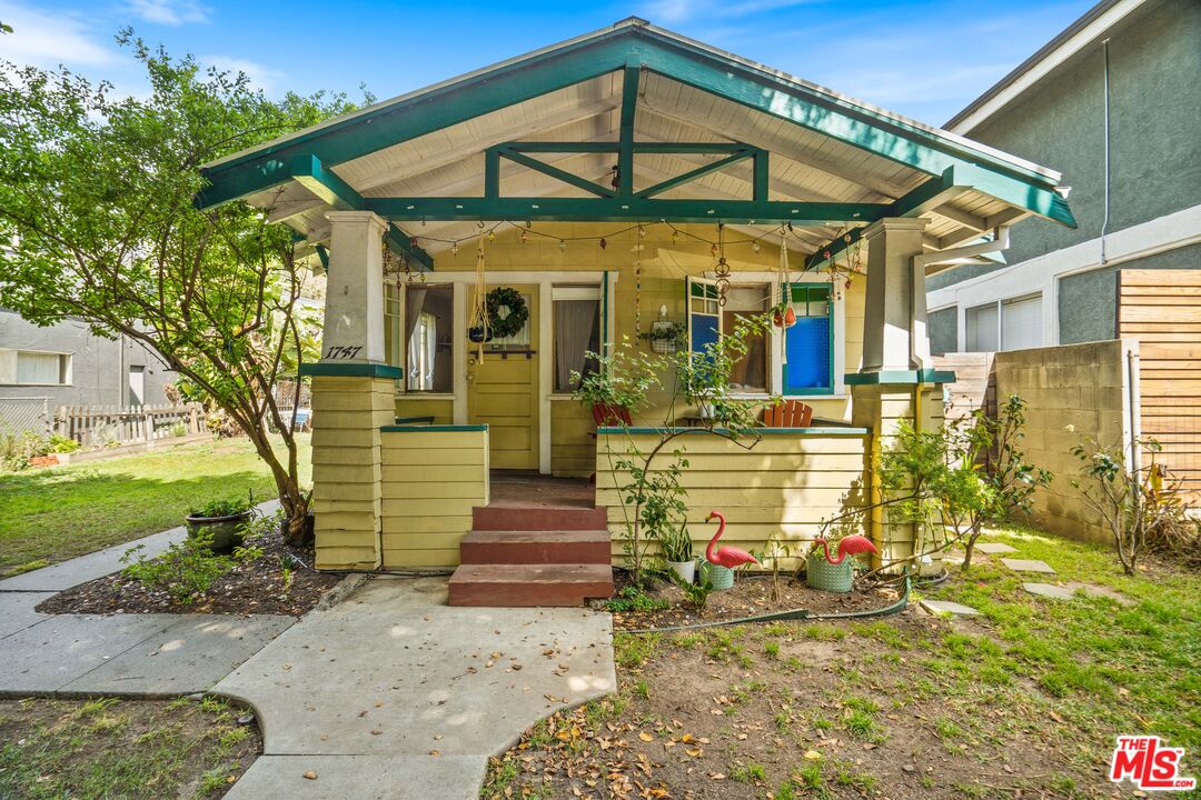 1747 9th Street Santa Monica, CA 90404 - Photo 6 of 24 a front view of a house with a yard