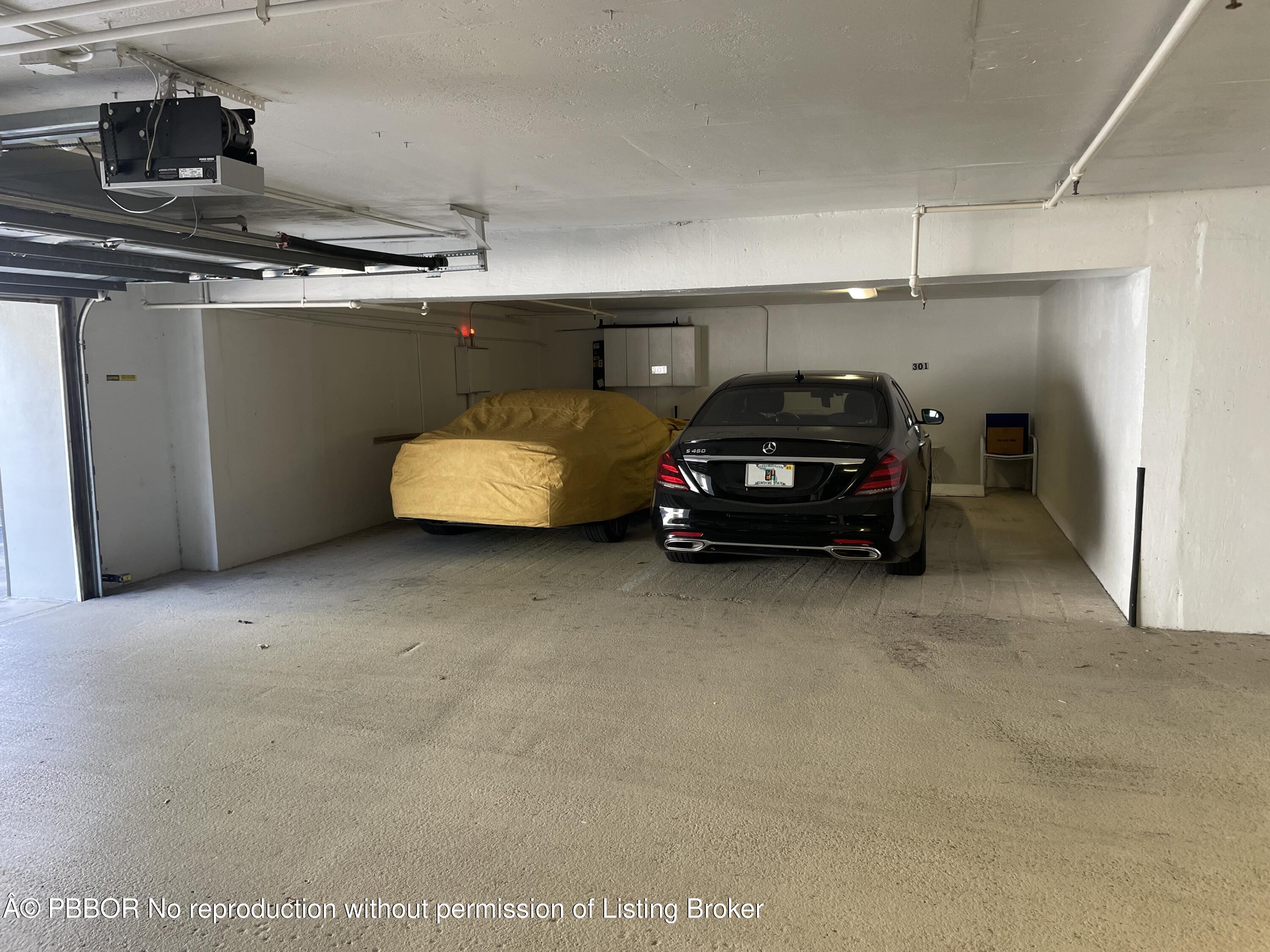 145 Peruvian Avenue, Unit 3010 Palm Beach, FL 33480 - Photo 11 of 18 a car parked in a parking garage