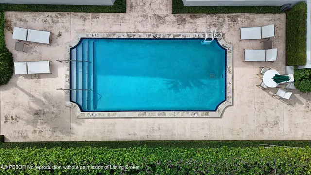 a front view of a building with a yard