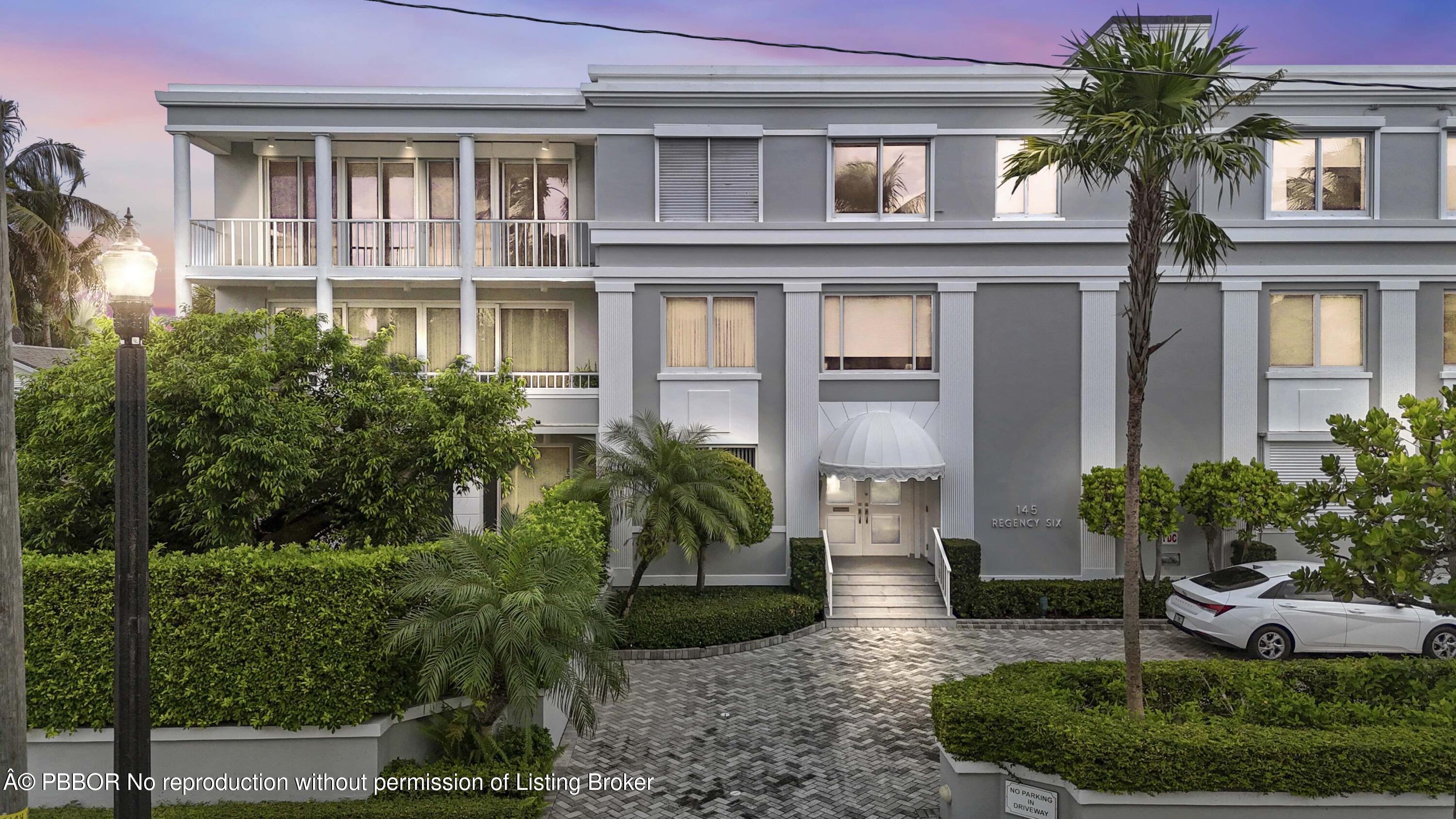145 Peruvian Avenue, Unit 3010 Palm Beach, FL 33480 - Photo 2 of 18 a front view of house with yard and green space
