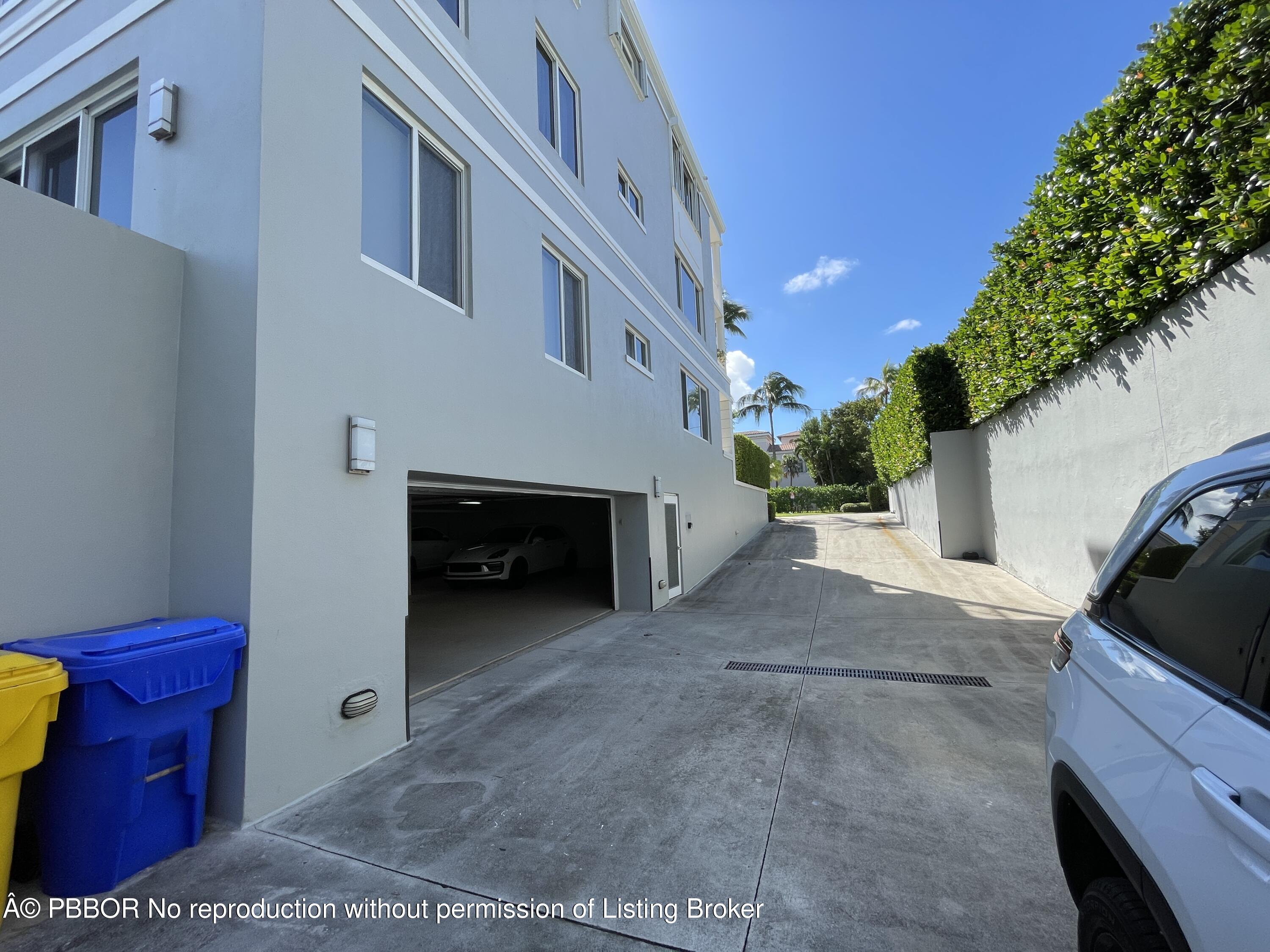 145 Peruvian Avenue, Unit 3010 Palm Beach, FL 33480 - Photo 9 of 18 a view of a house with a garage
