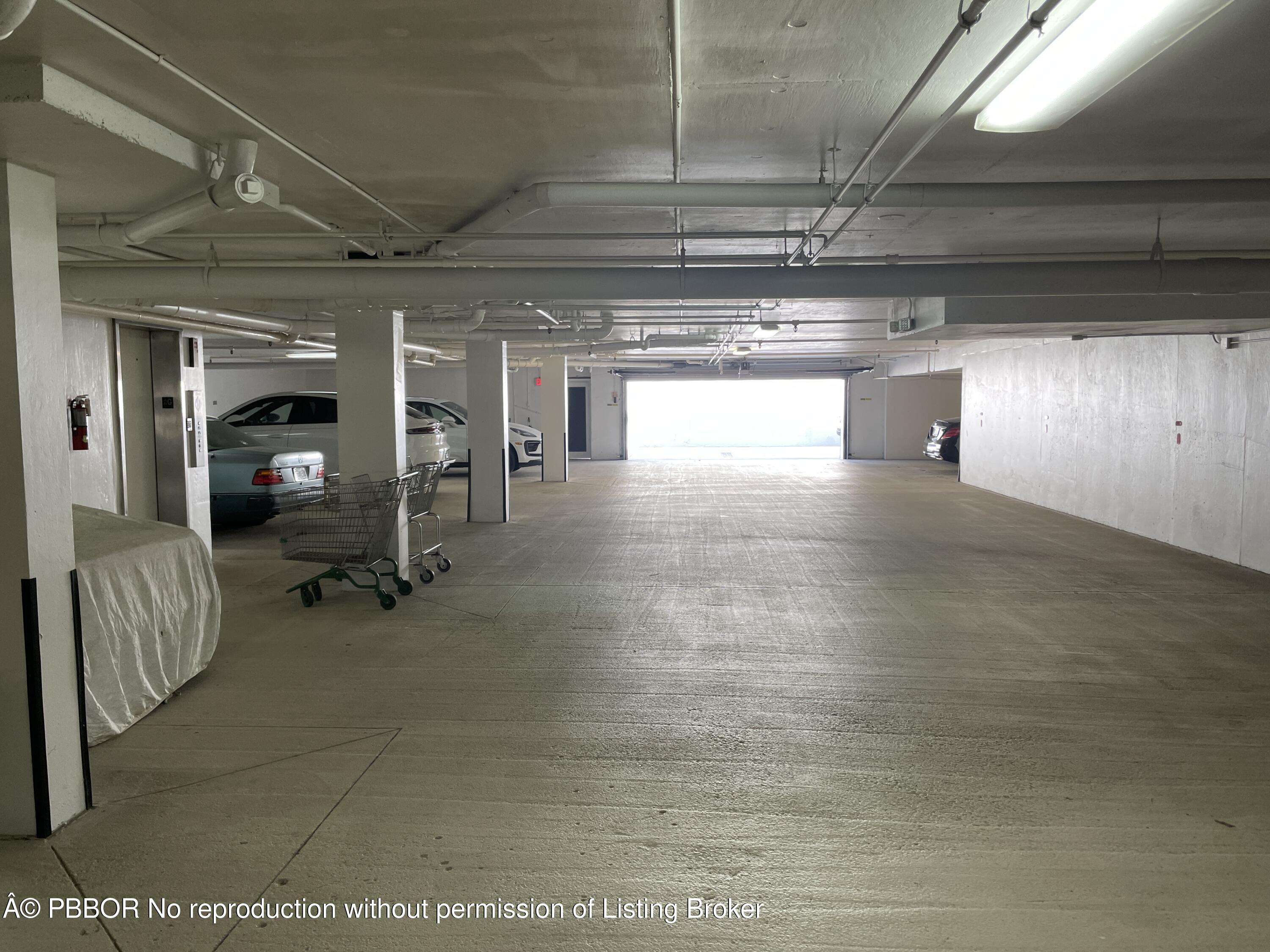 145 Peruvian Avenue, Unit 3010 Palm Beach, FL 33480 - Photo 10 of 18 a room with gym equipment and large mirror