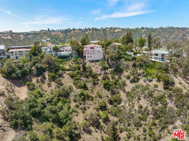an aerial view of lake residential house with outdoor space and river