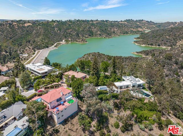 a aerial view of a house with a balcony