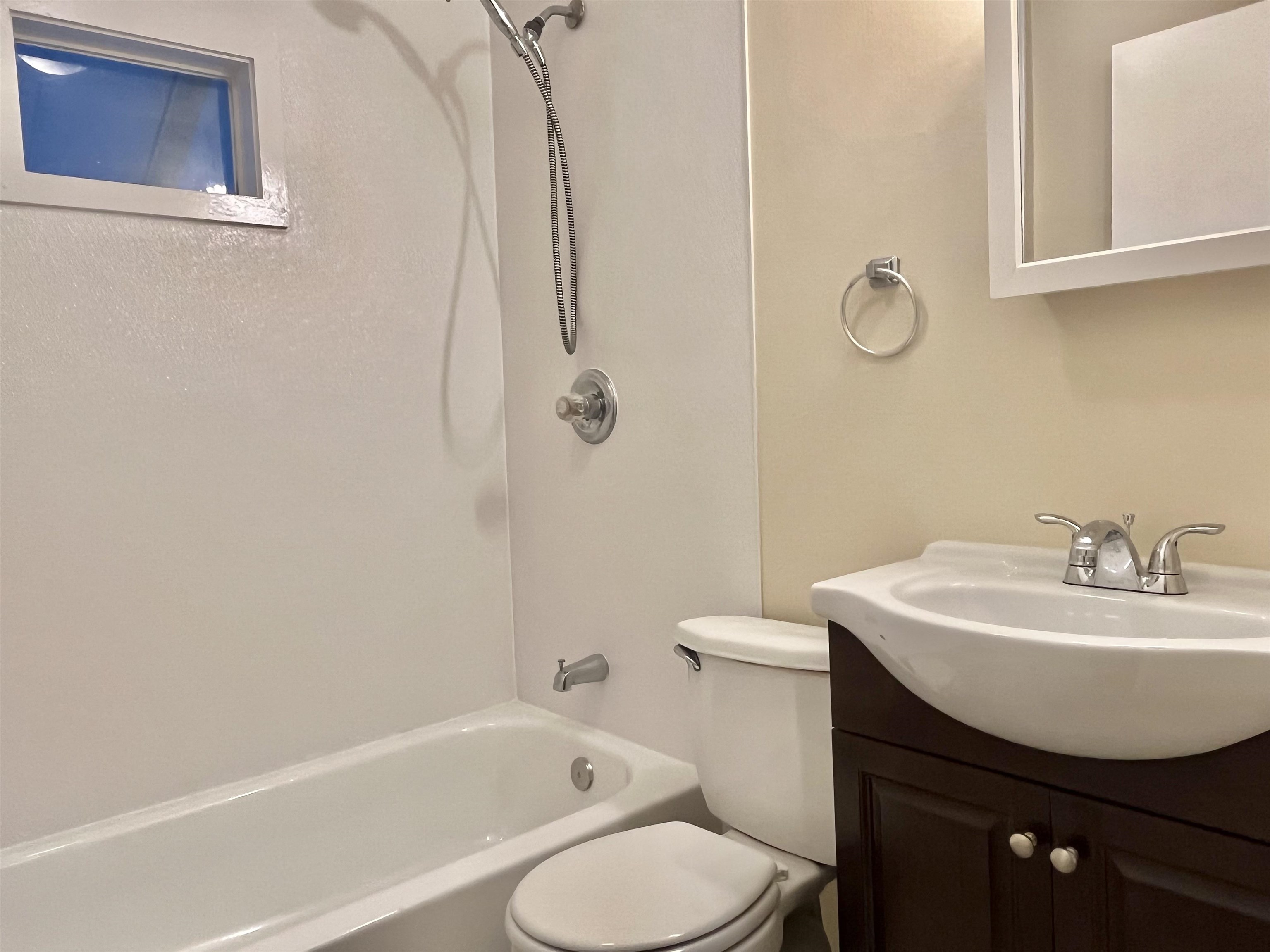 33 Evergreen Avenue, Unit B St. Augustine, FL 32084 - Photo 11 of 13 a bathroom with a sink toilet and a bathtub