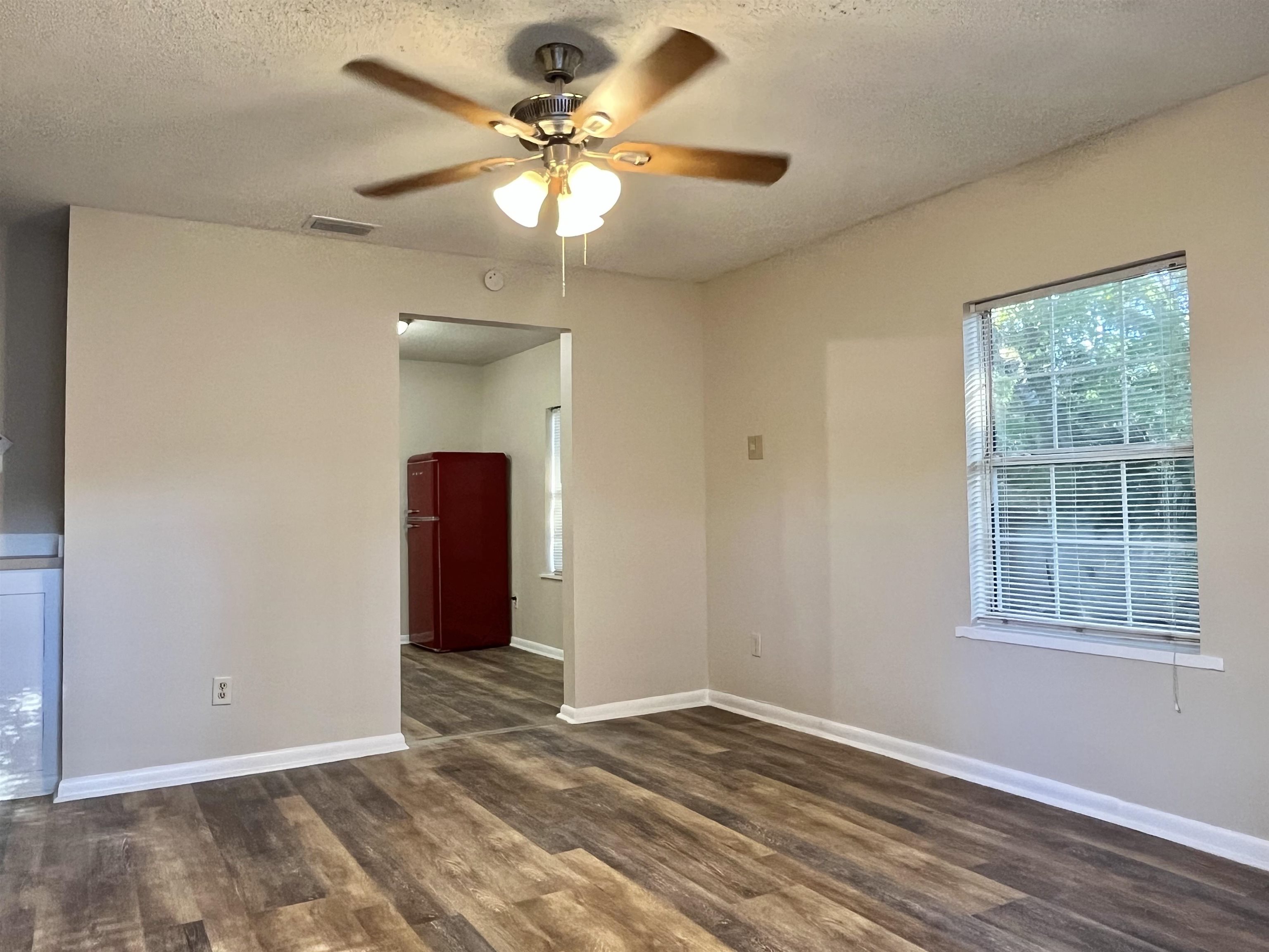 33 Evergreen Avenue, Unit B St. Augustine, FL 32084 - Photo 5 of 13 a view of an empty room with a window