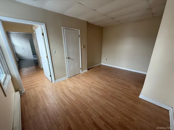 wooden floor in a hall with an entryway