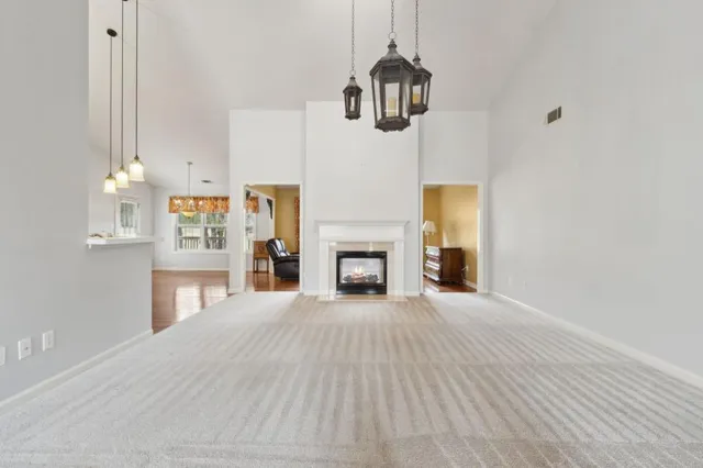 a kitchen with stainless steel appliances a refrigerator sink and cabinets