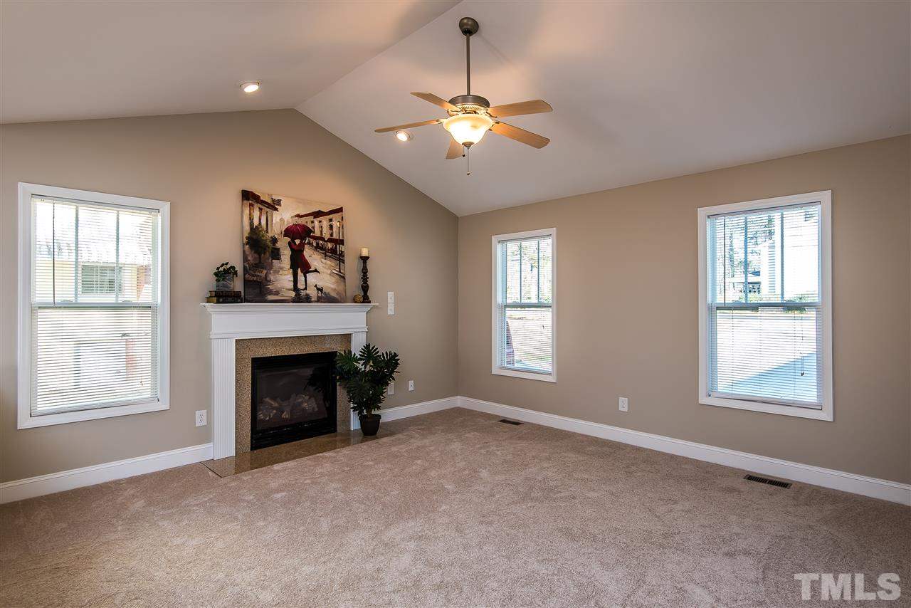 3104 Hope Valley Road Durham, NC 27707 - Photo 3 of 12 Vaulted Ceiling, Ceiling Fan and Gas Log Fireplace makes for a Cozy, Comfortable space to relax or entertain.