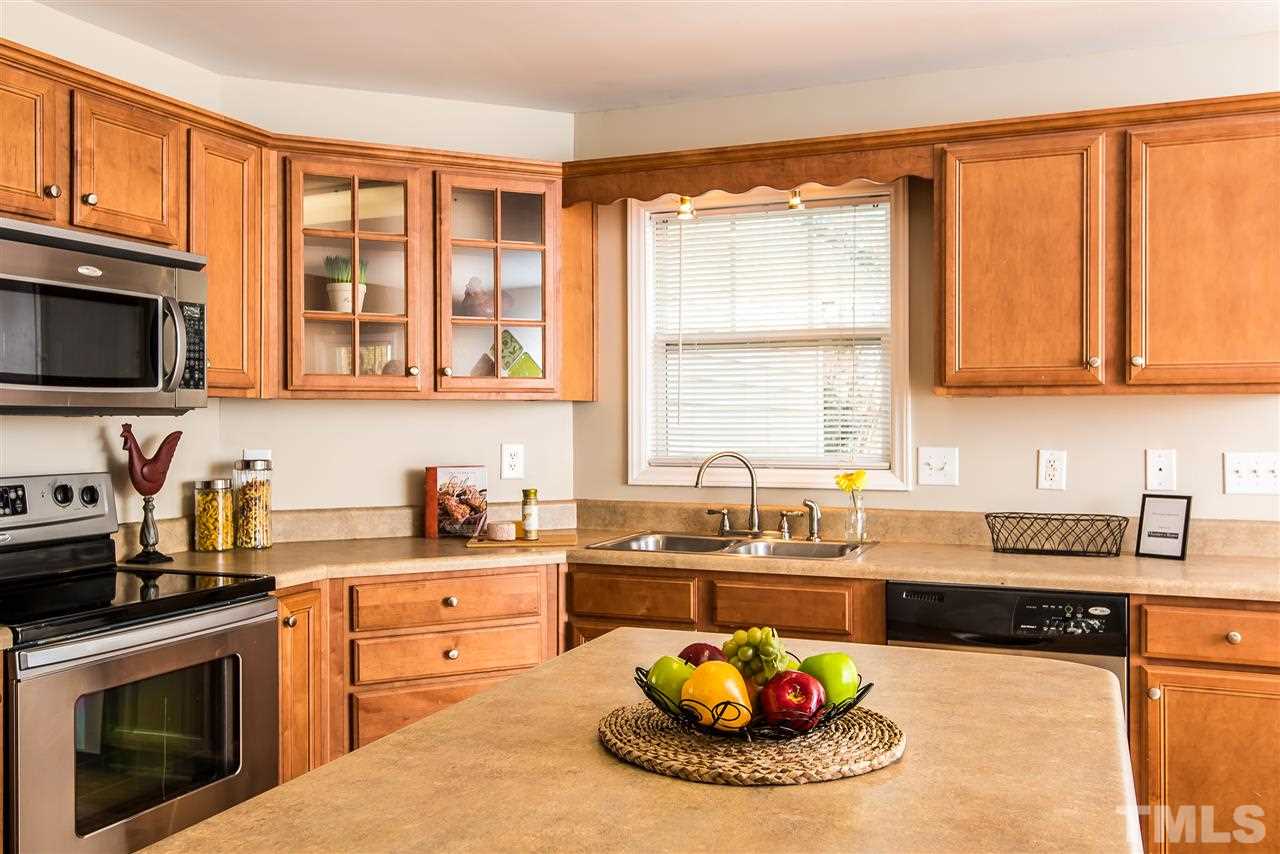 3104 Hope Valley Road Durham, NC 27707 - Photo 5 of 12 SS Appliances + Maple cabinets create a Clean Kitchen.
