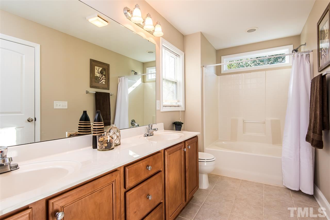 3104 Hope Valley Road Durham, NC 27707 - Photo 9 of 12 Lots of light with transom window. Dual vanity and tile floors.