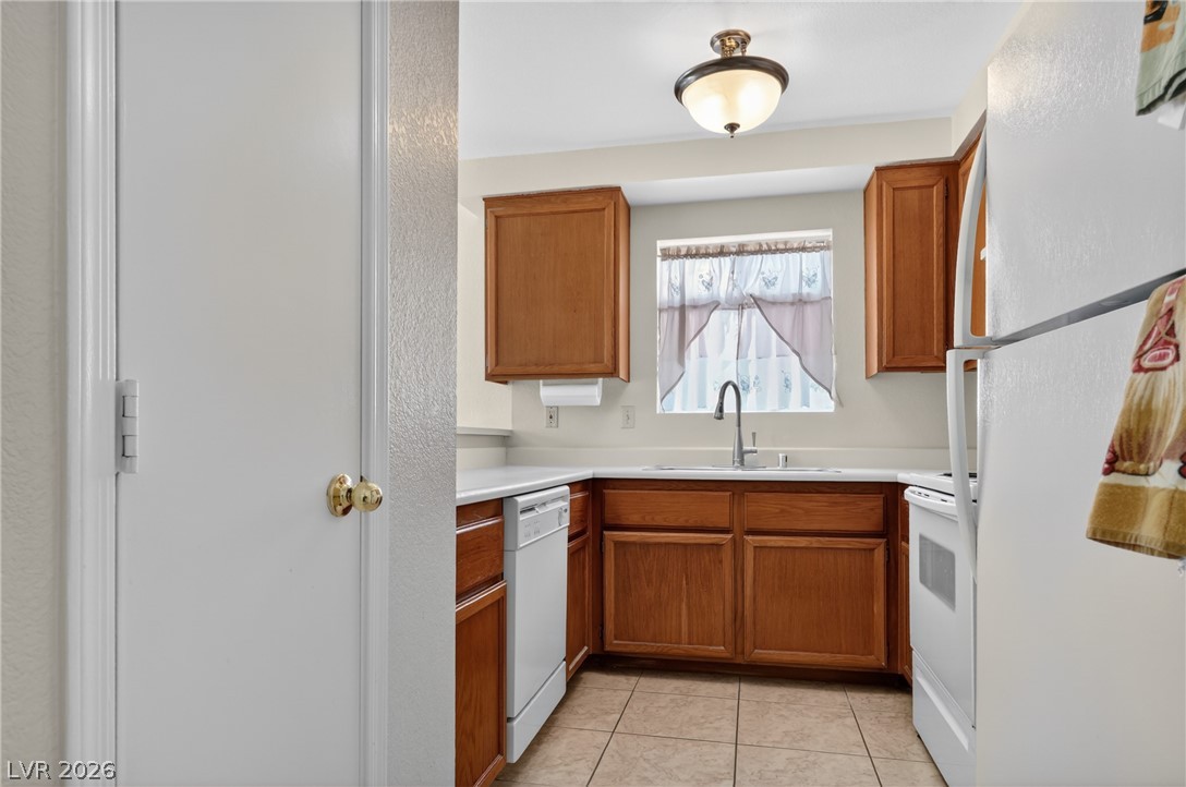 2241 Highpointe Drive, Unit 101 Laughlin, NV 89029 - Photo 11 of 23 This efficient kitchen offers ample cabinetry and appliances, making meal preparation effortless.