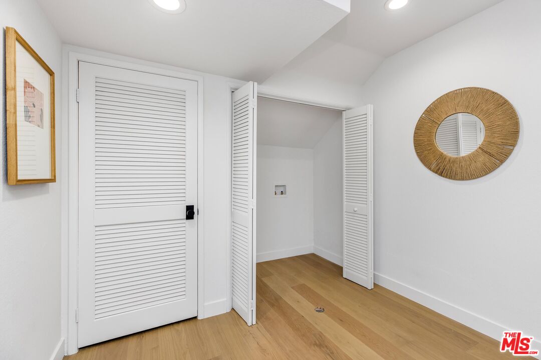 14234 Dickens Street, Unit 2 Sherman Oaks, CA 91423 - Photo 25 of 29 a view of a room with wooden floor