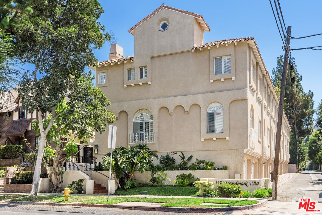 14234 Dickens Street, Unit 2 Sherman Oaks, CA 91423 - Photo 29 of 29 a front view of a house with garden