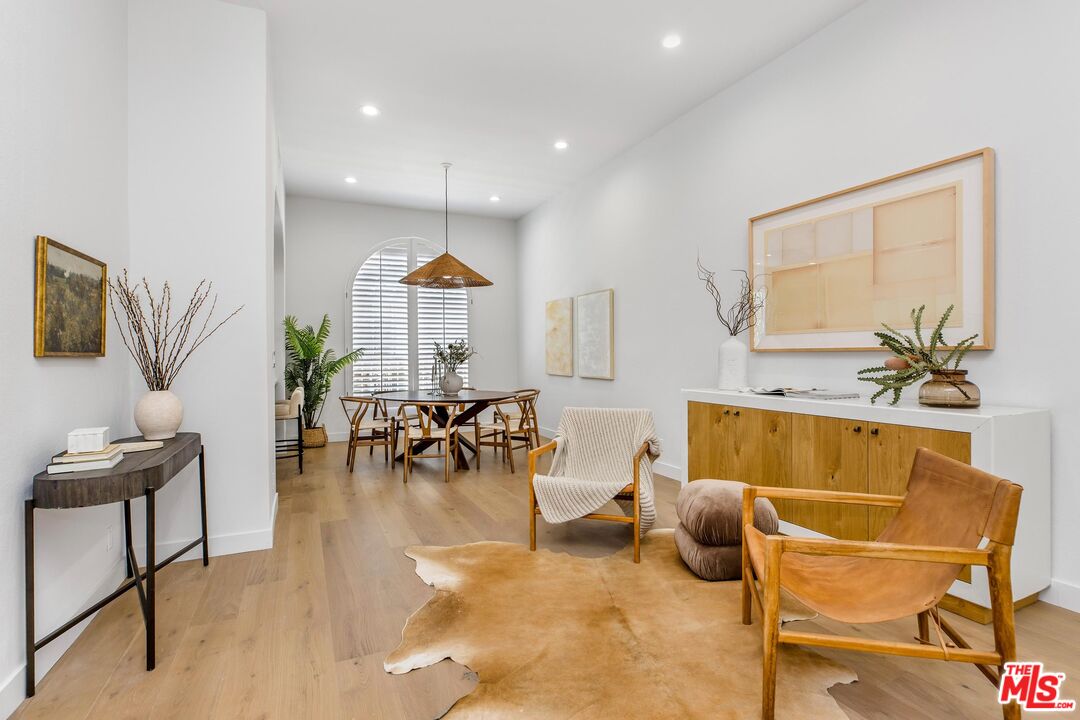 14234 Dickens Street, Unit 2 Sherman Oaks, CA 91423 - Photo 5 of 29 a living room with furniture and wooden floor