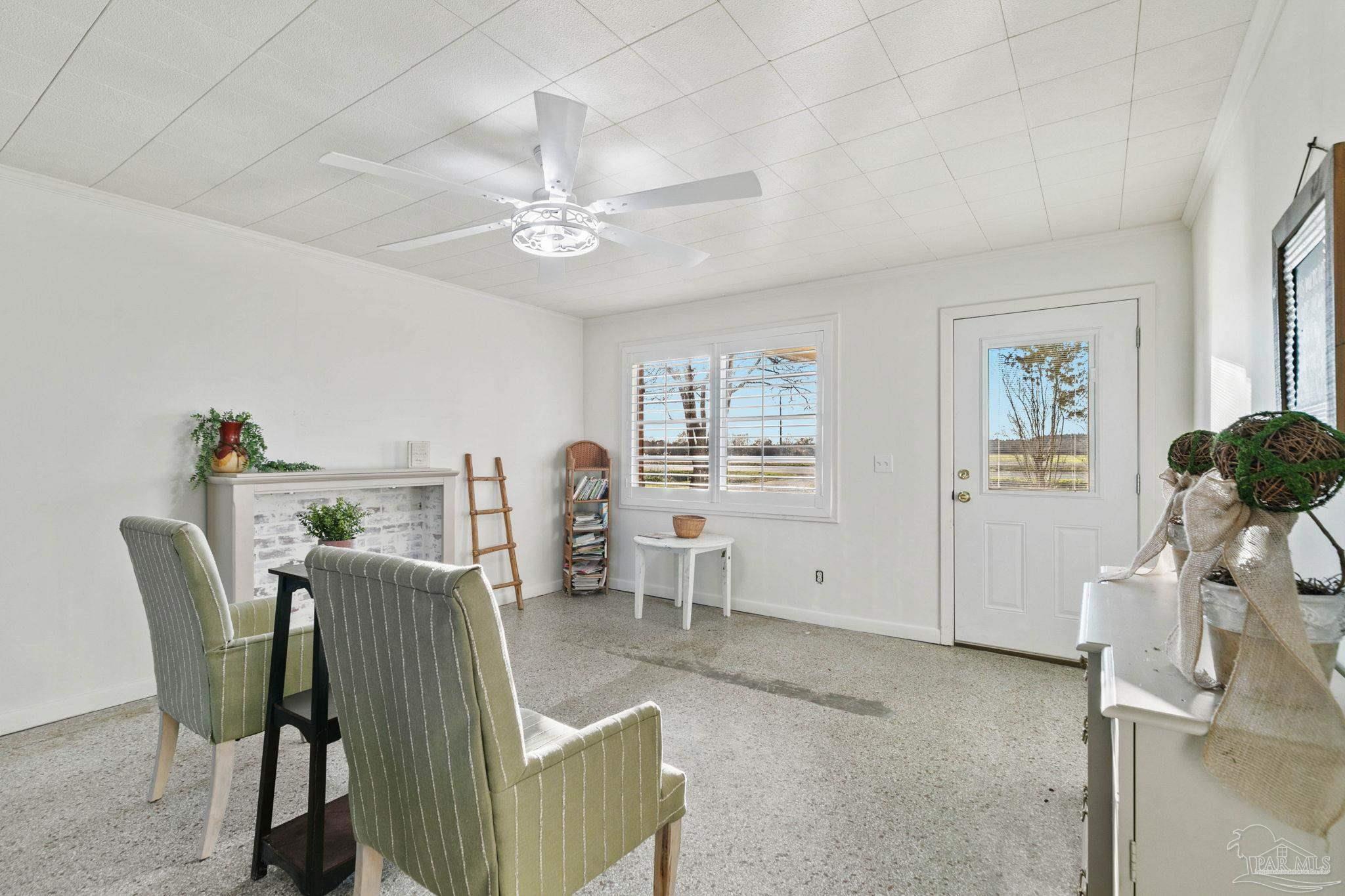 5024 Highway 21 Atmore, AL 36502 - Photo 11 of 38 a view of a livingroom with furniture and a window