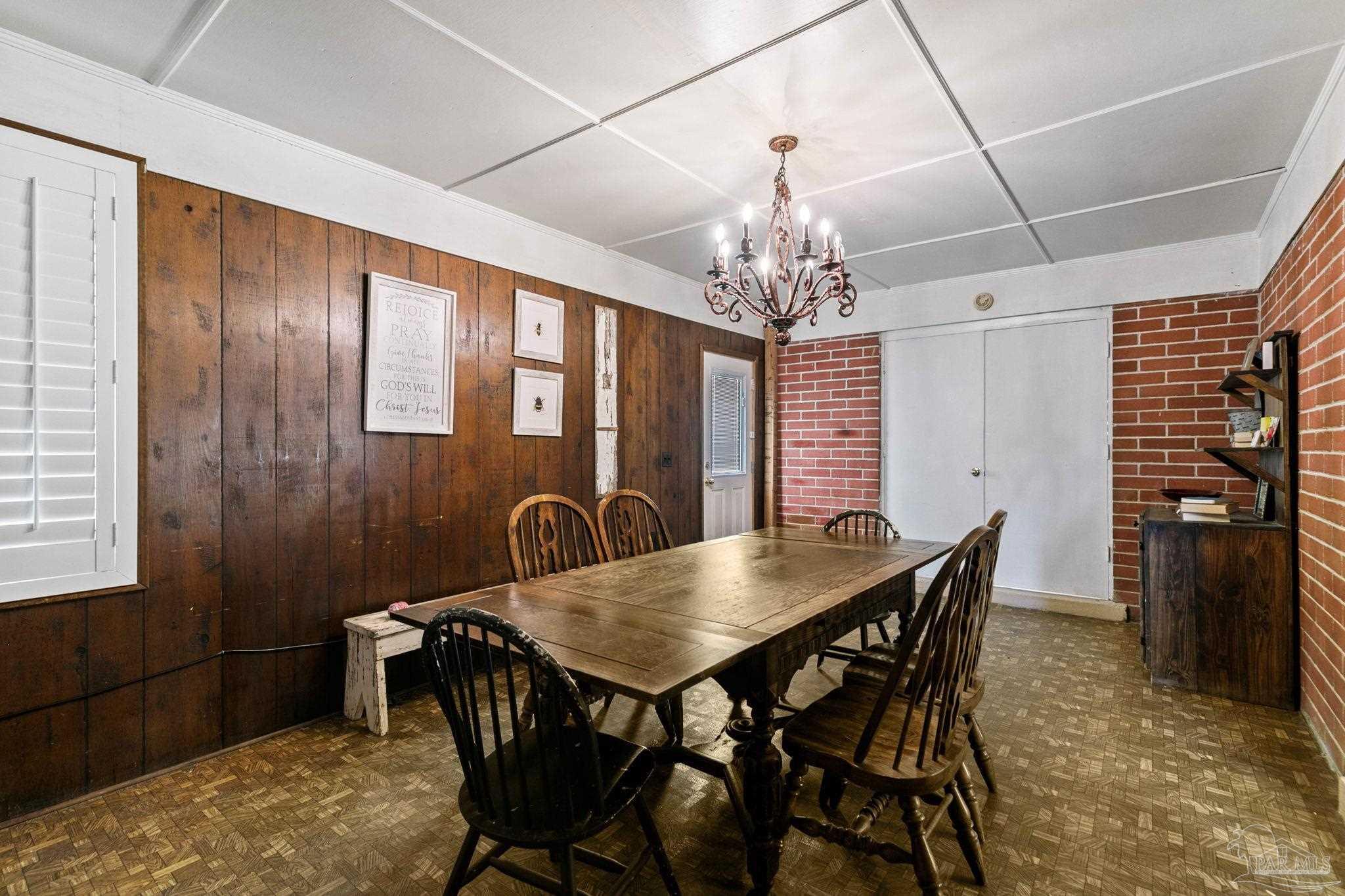 5024 Highway 21 Atmore, AL 36502 - Photo 20 of 38 a view of a dining room with furniture and chandelier