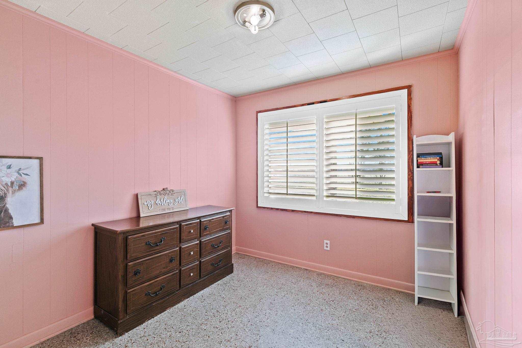 5024 Highway 21 Atmore, AL 36502 - Photo 24 of 38 a room with a dresser and a window