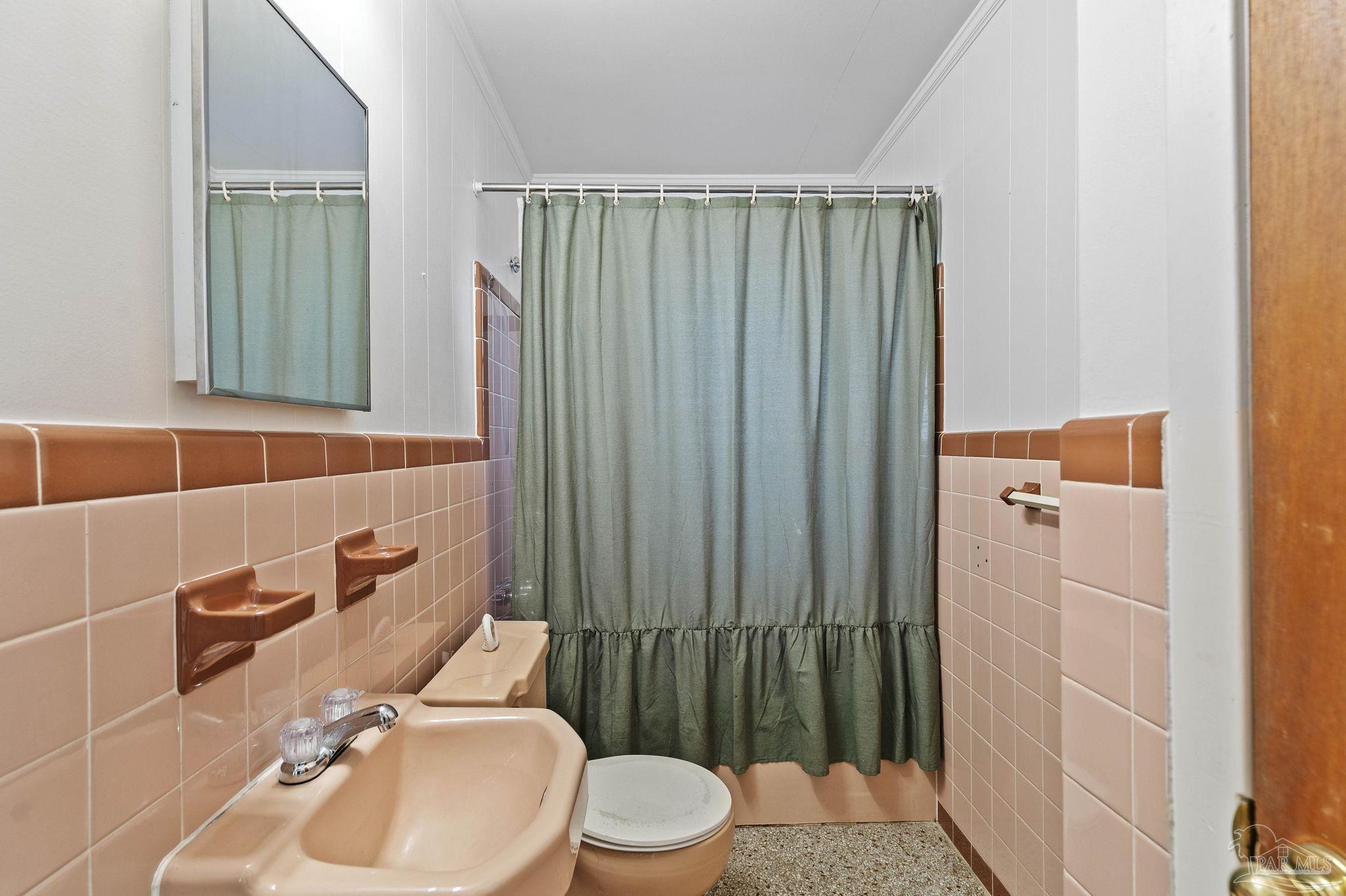 5024 Highway 21 Atmore, AL 36502 - Photo 26 of 38 a bathroom with a sink toilet and shower