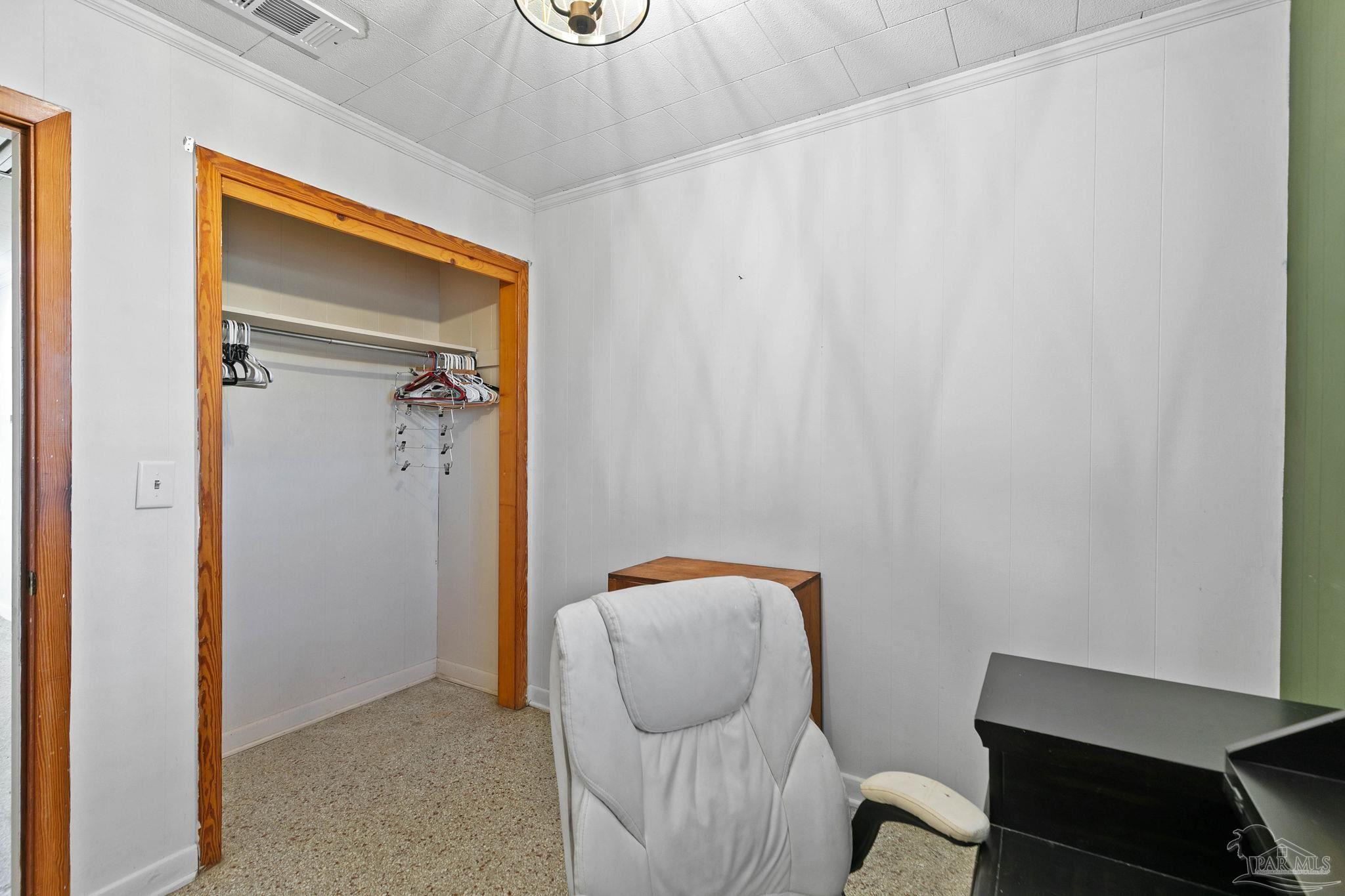 5024 Highway 21 Atmore, AL 36502 - Photo 28 of 38 a view of a room with a door and a chair