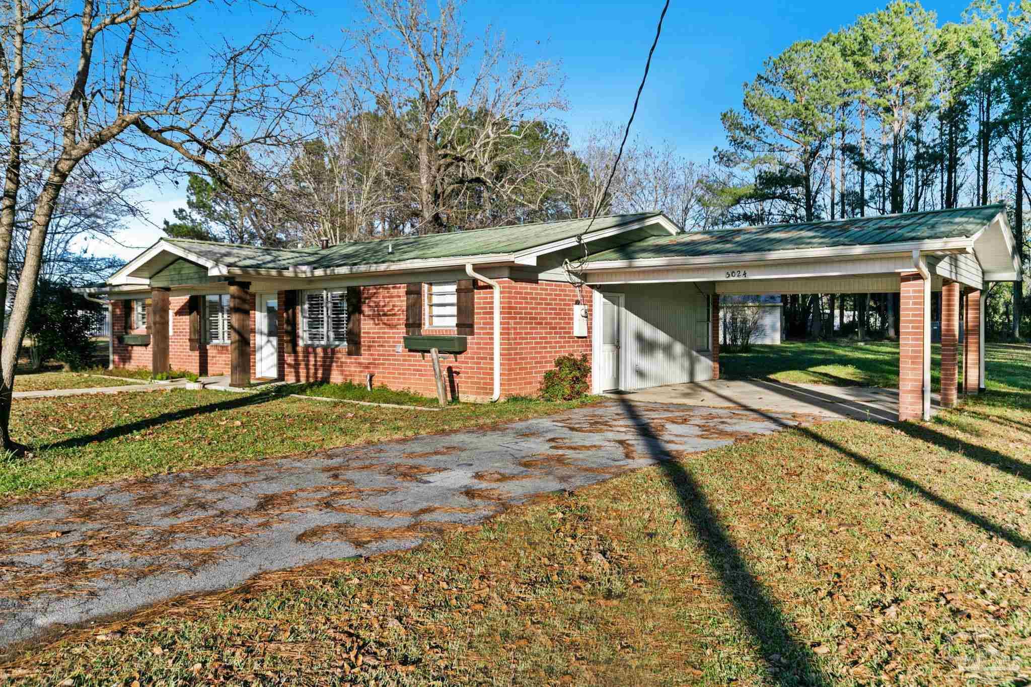 5024 Highway 21 Atmore, AL 36502 - Photo 8 of 38 a view of a house with a yard