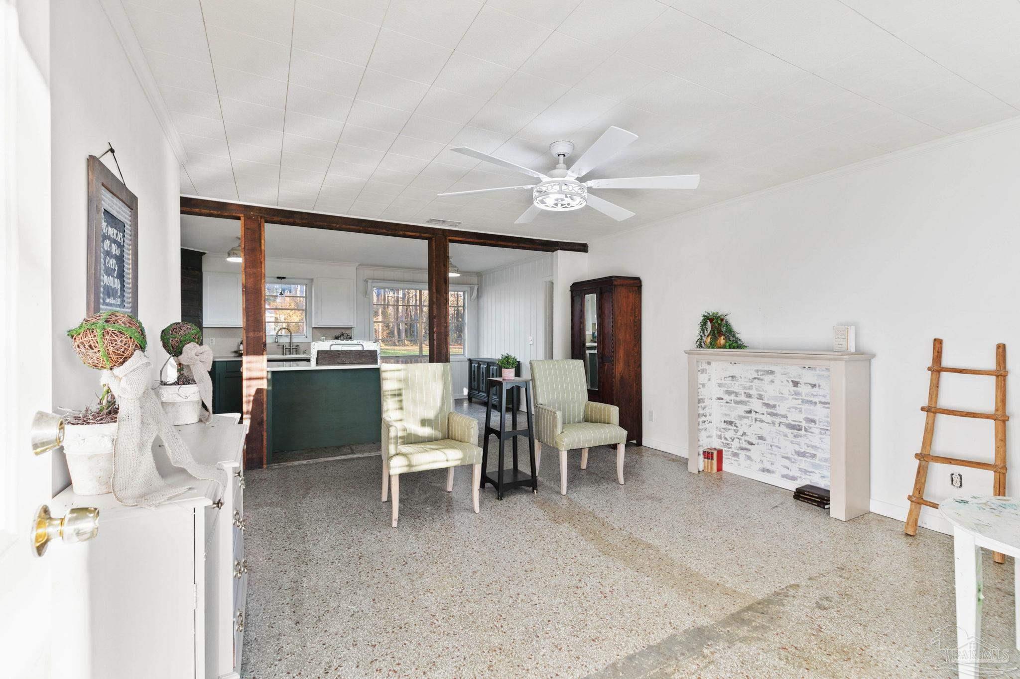 5024 Highway 21 Atmore, AL 36502 - Photo 10 of 38 a living room with furniture a flat screen tv and a table