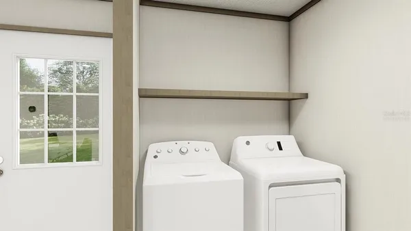 a utility room with dryer and washer