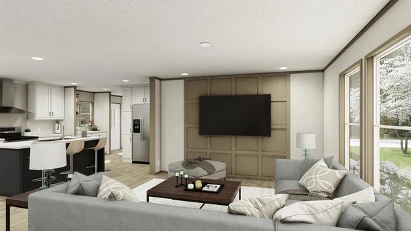 a living room with furniture a flat screen tv and a large window