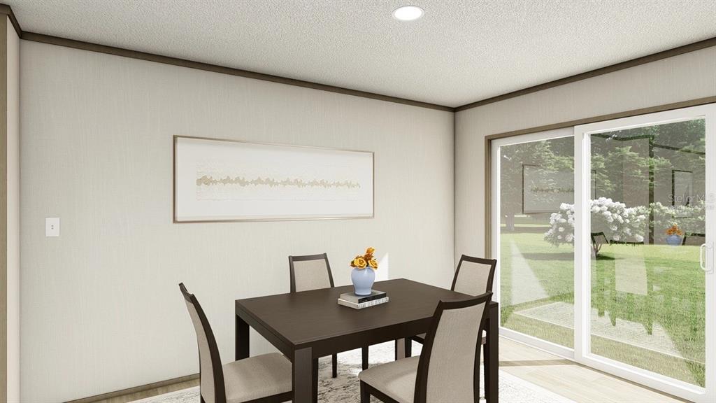 40410 Country Road Eustis, FL 32736 - Photo 5 of 16 a view of a dining room with furniture window and outside view
