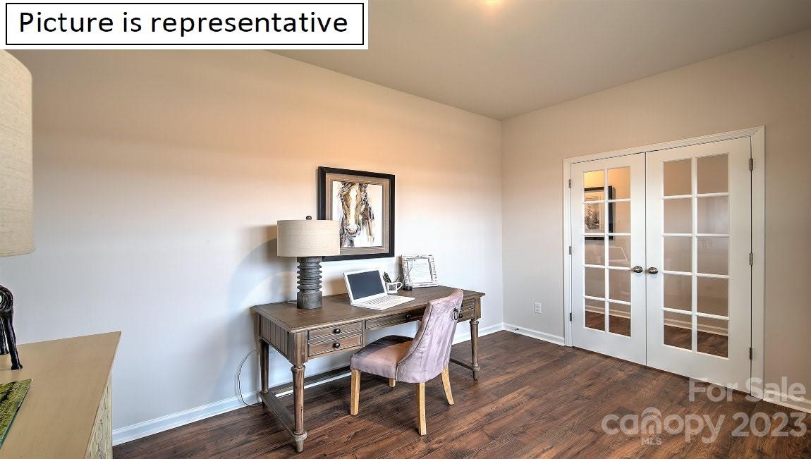 111 Beech Tree Lane Locust, NC 28097 - Photo 5 of 37 a view of a dining room with furniture and wooden floor