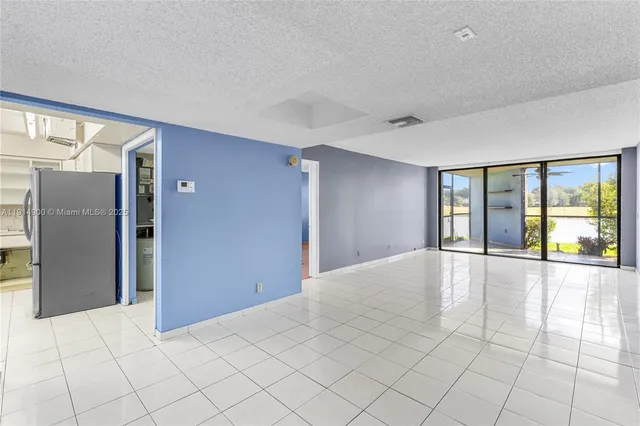 a view of an empty room with window