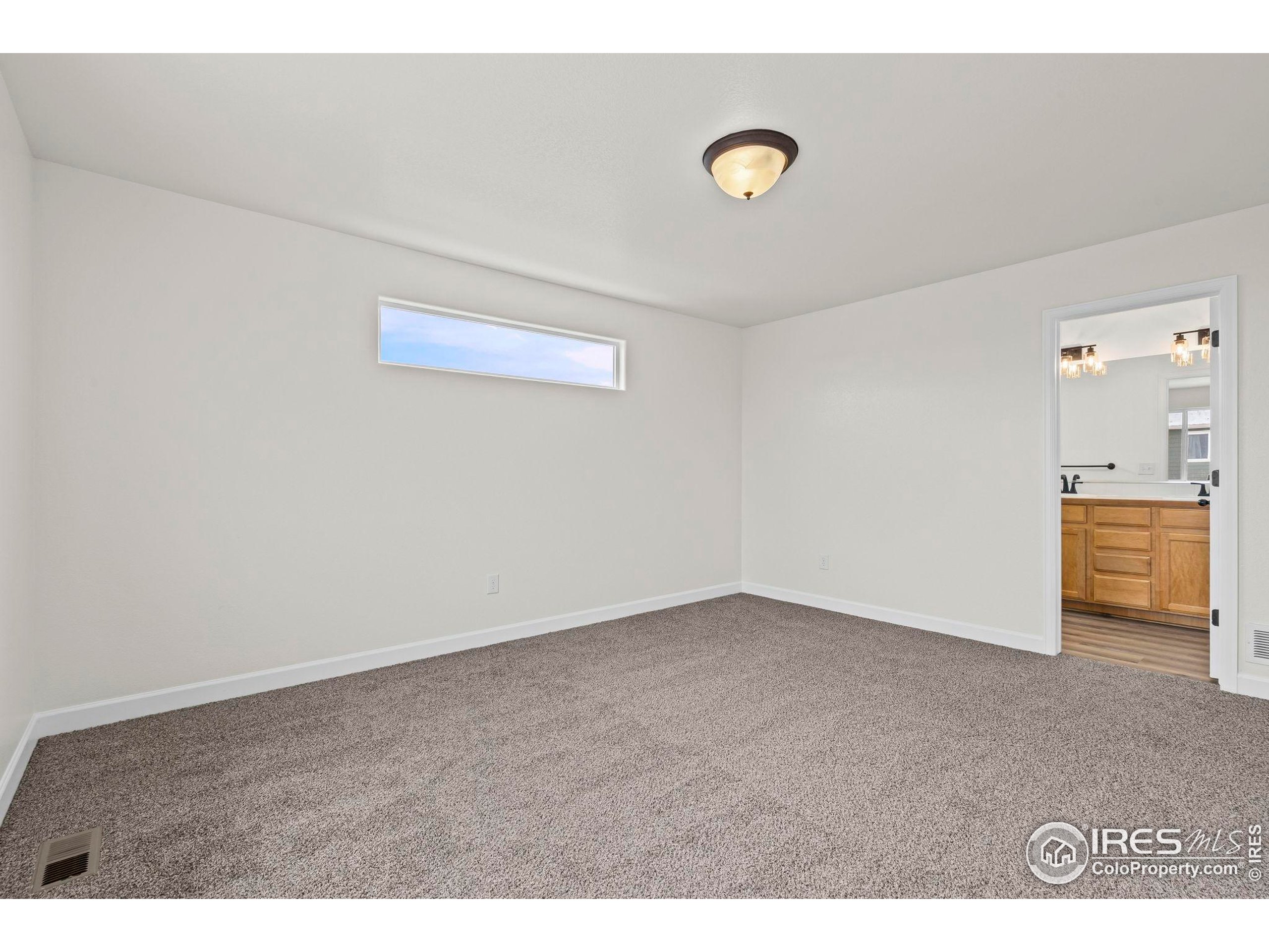 7324 Atlantis Street Wellington, CO 80549 - Photo 22 of 31 a view of an empty room