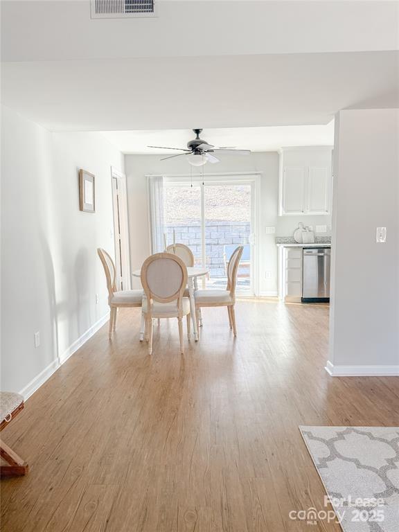 8224 Rittenhouse Circle Charlotte, NC 28270 - Photo 18 of 34 a view of a dining room with furniture and wooden floor