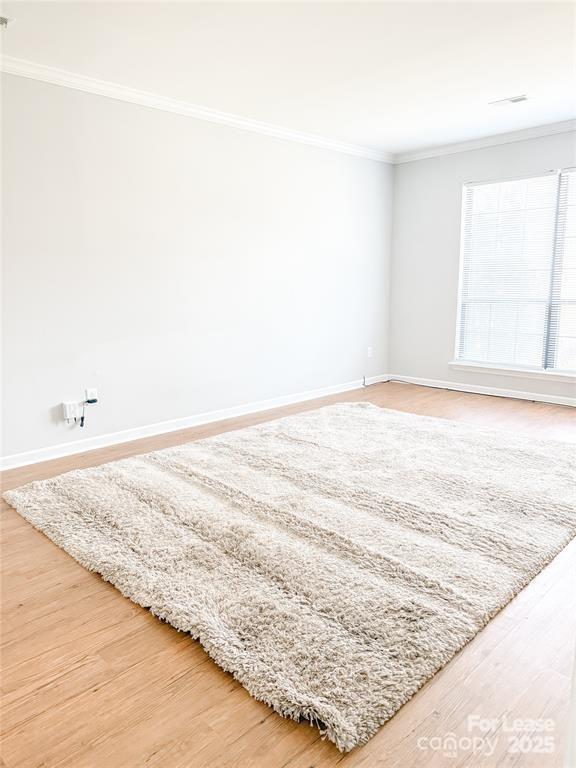 8224 Rittenhouse Circle Charlotte, NC 28270 - Photo 21 of 34 a view of empty room with wooden floor