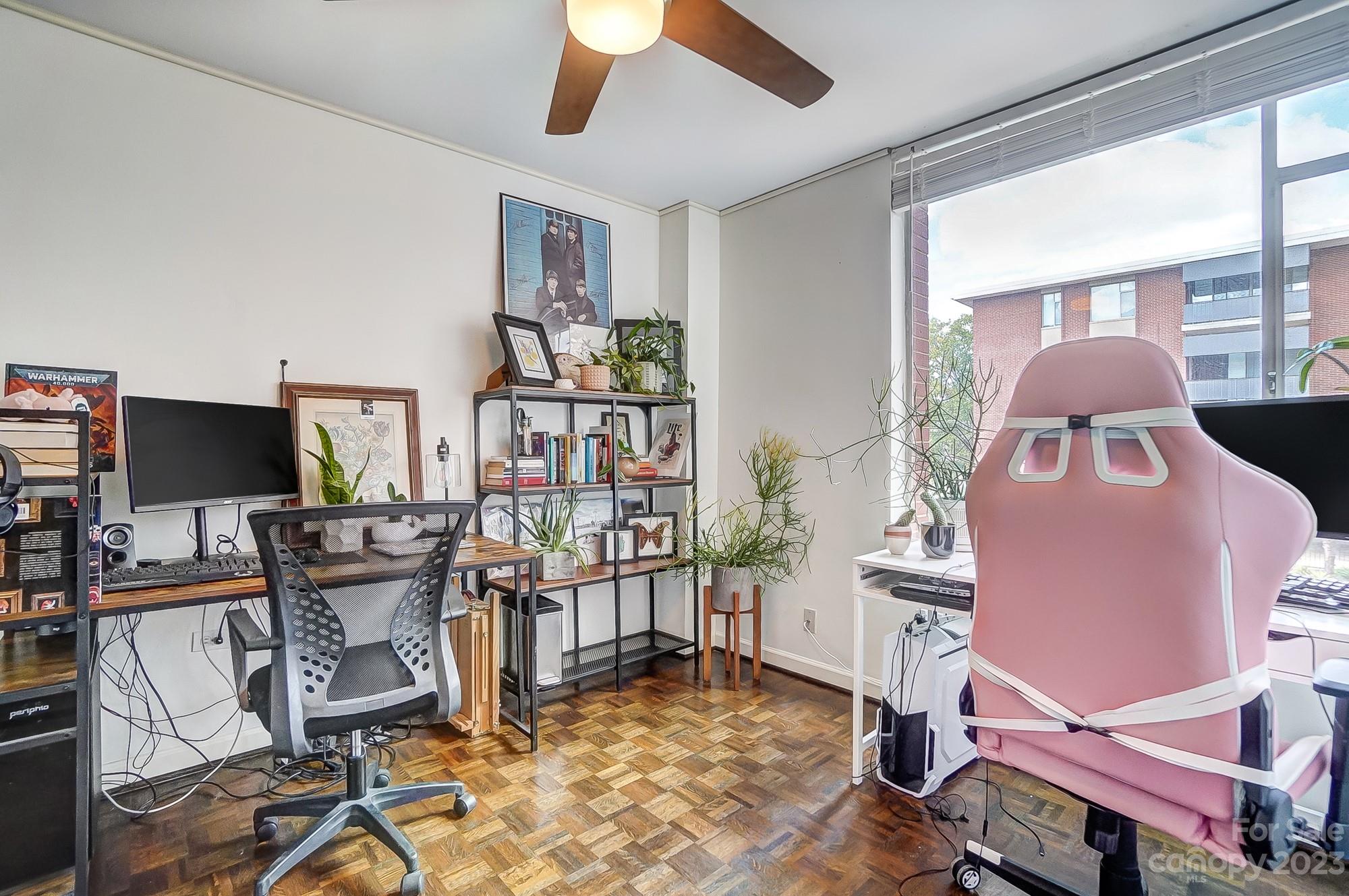 1300 Queens Road, Unit 208 Charlotte, NC 28207 - Photo 26 of 34 a view of a workspace with furniture and a window