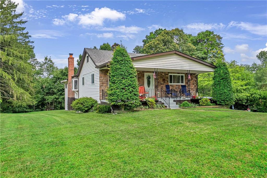 5403 Hardt Road Gibsonia, PA 15044 - Photo 1 of 41 a view of a house with a yard and potted plants