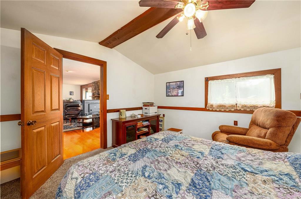 5403 Hardt Road Gibsonia, PA 15044 - Photo 20 of 41 a bedroom with furniture and a flat screen tv
