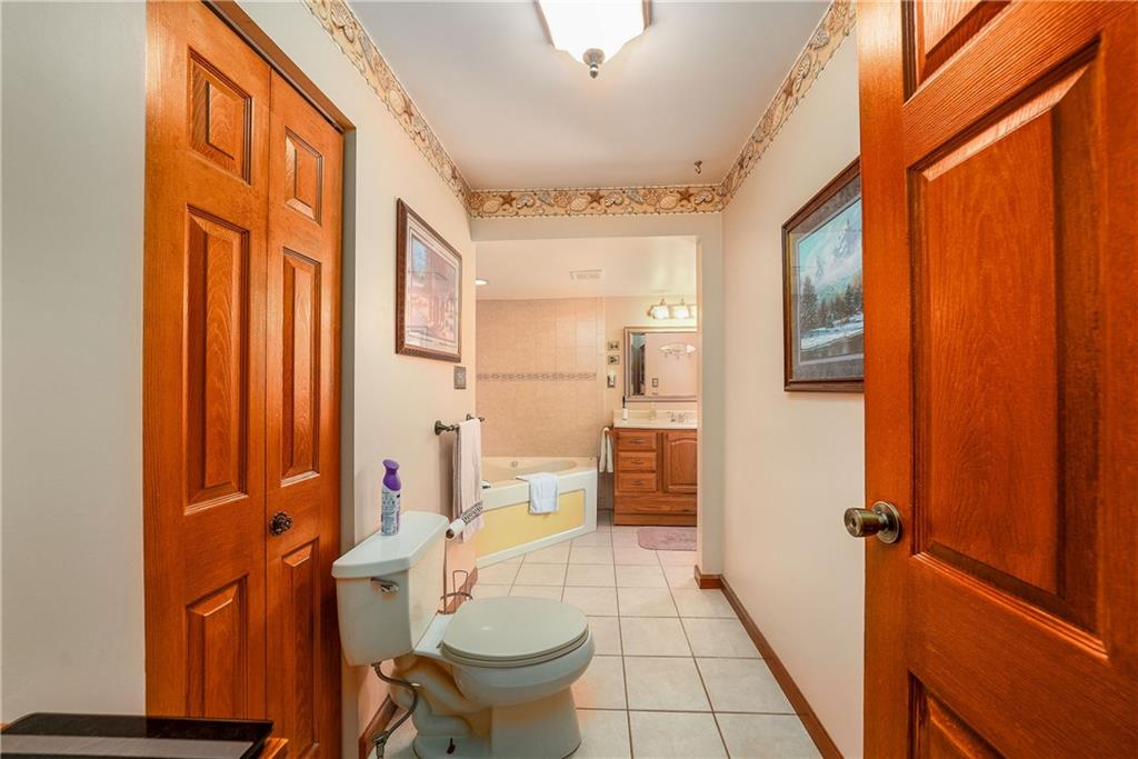 5403 Hardt Road Gibsonia, PA 15044 - Photo 22 of 41 a bathroom with a sink toilet and shower