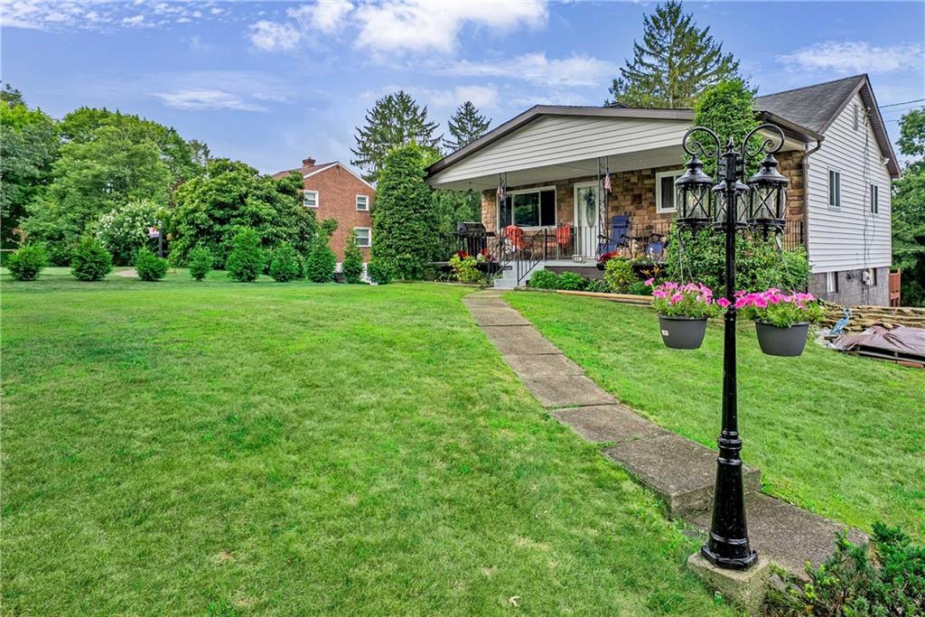 5403 Hardt Road Gibsonia, PA 15044 - Photo 3 of 41 a front view of a house with garden