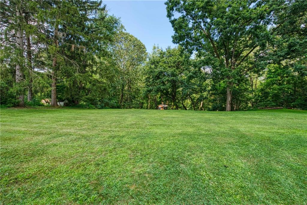 5403 Hardt Road Gibsonia, PA 15044 - Photo 35 of 41 a view of green field with trees in the background