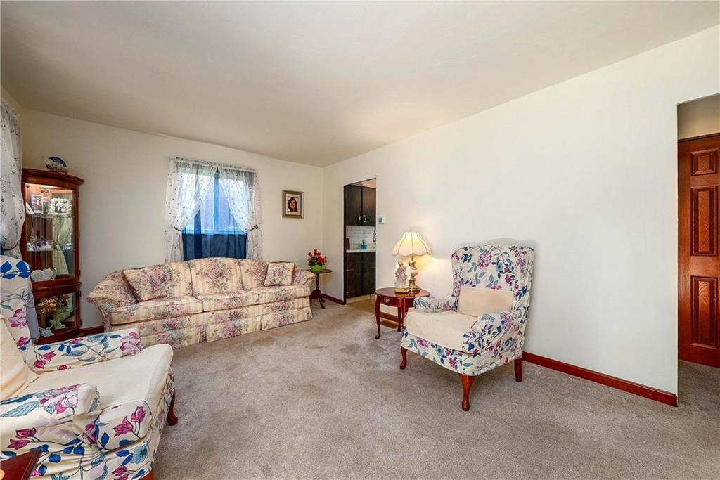 5403 Hardt Road Gibsonia, PA 15044 - Photo 5 of 41 a living room with furniture and painting on the wall