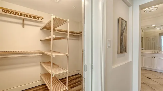 a very nice looking dining room with lots of furniture and chandelier