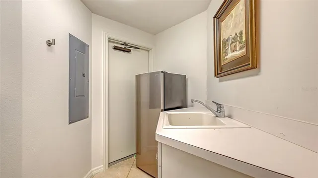 a front view of a building with a garden