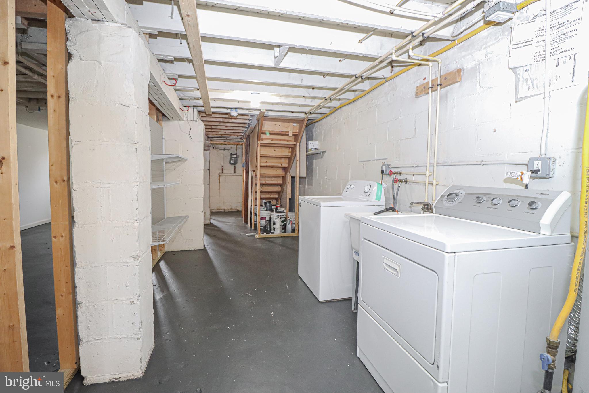2933 Cornwall Road Baltimore, MD 21222 - Photo 29 of 35 Basement with Laundry and storage shelves