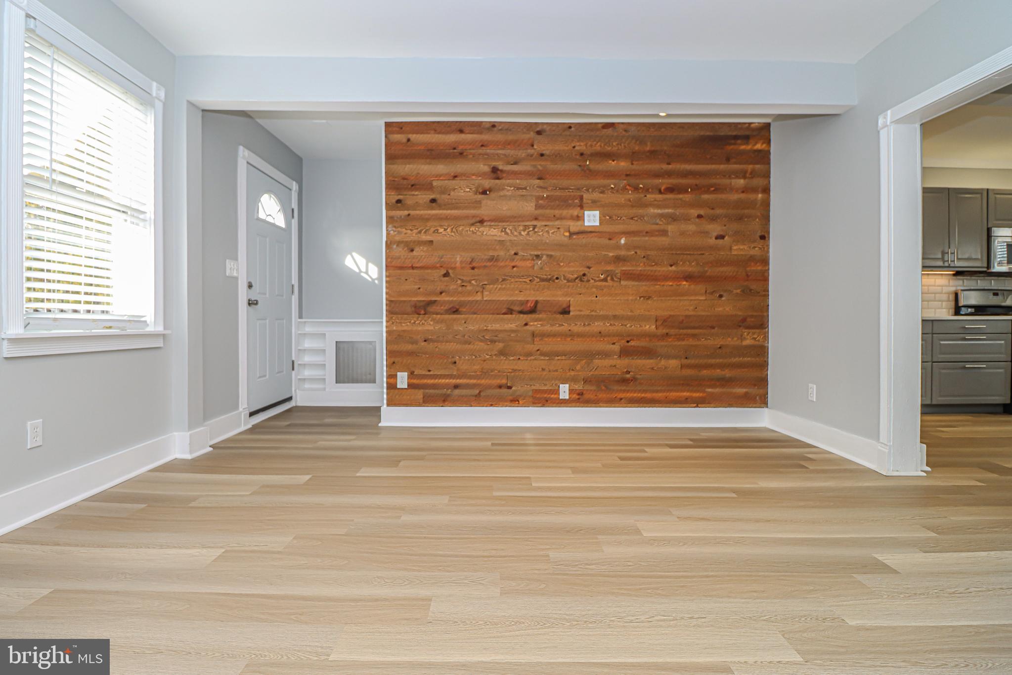 2933 Cornwall Road Baltimore, MD 21222 - Photo 4 of 35 Pallet accent wall in living room