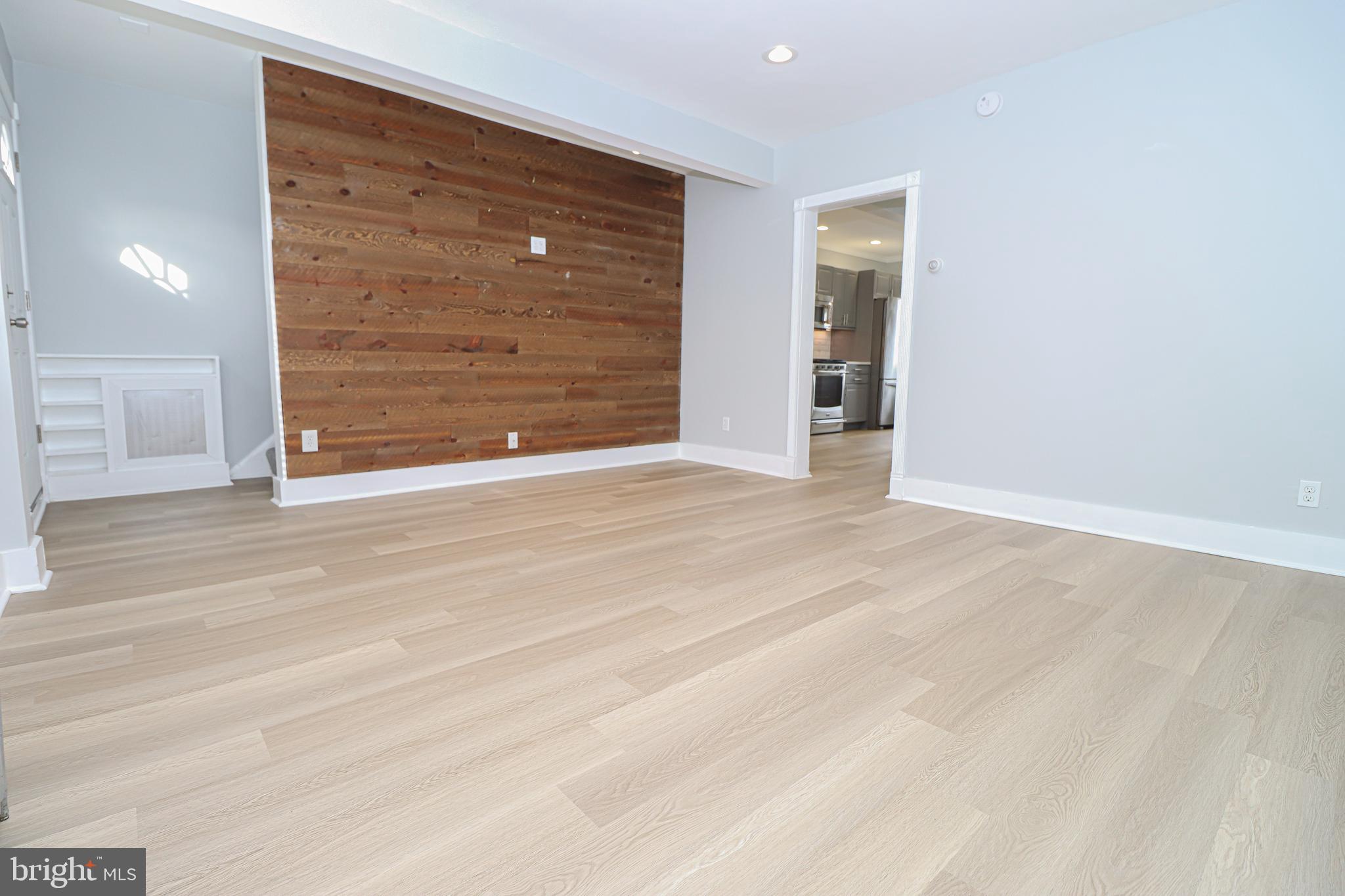 2933 Cornwall Road Baltimore, MD 21222 - Photo 5 of 35 Large living room and built in entry shelves