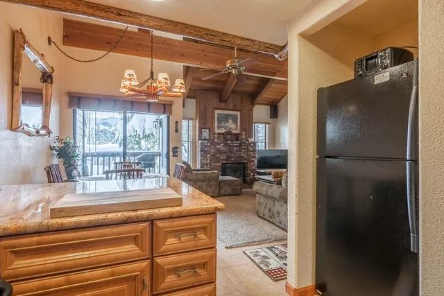 a view of a living room and entry way
